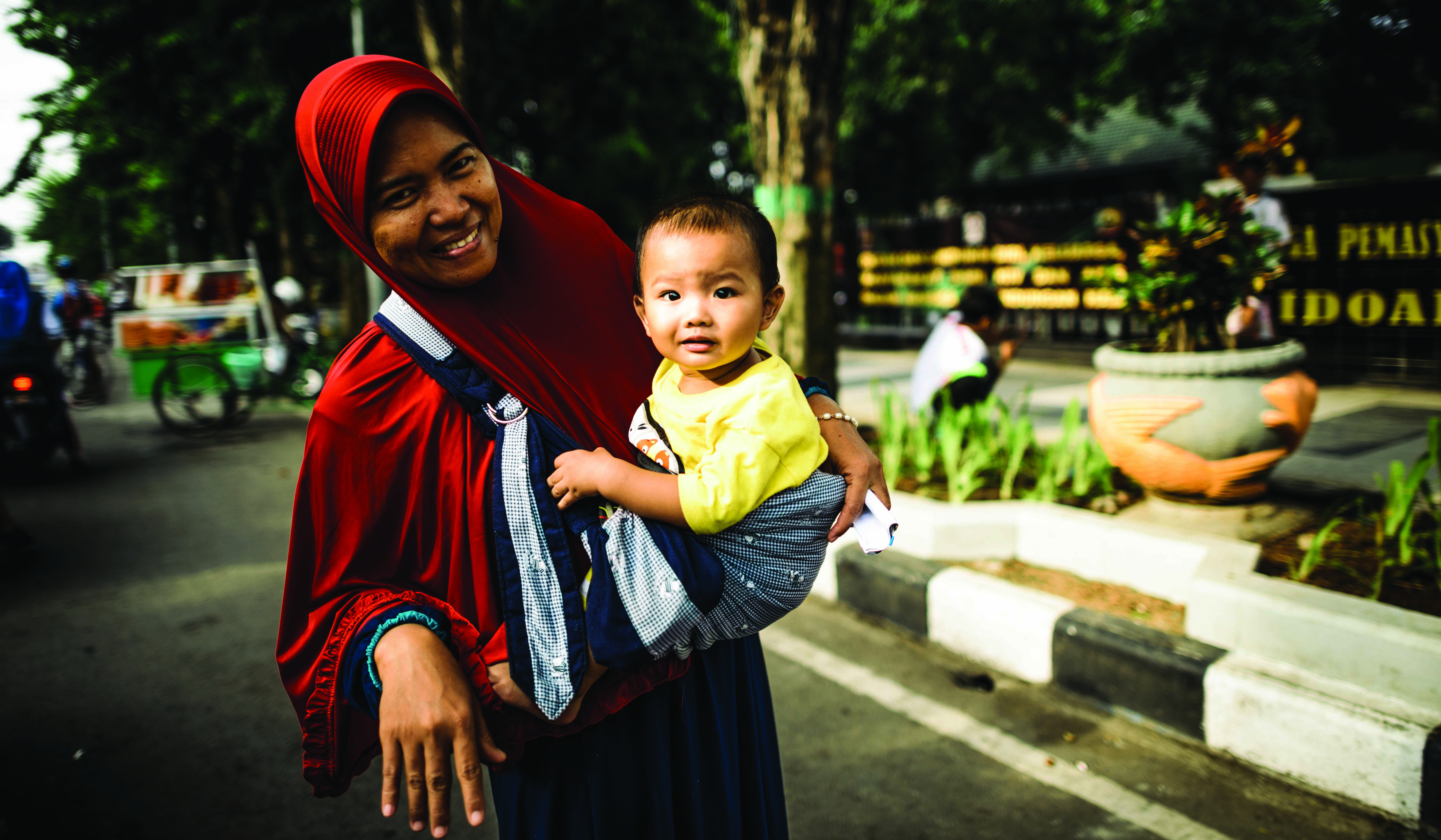 Muslim woman and a child