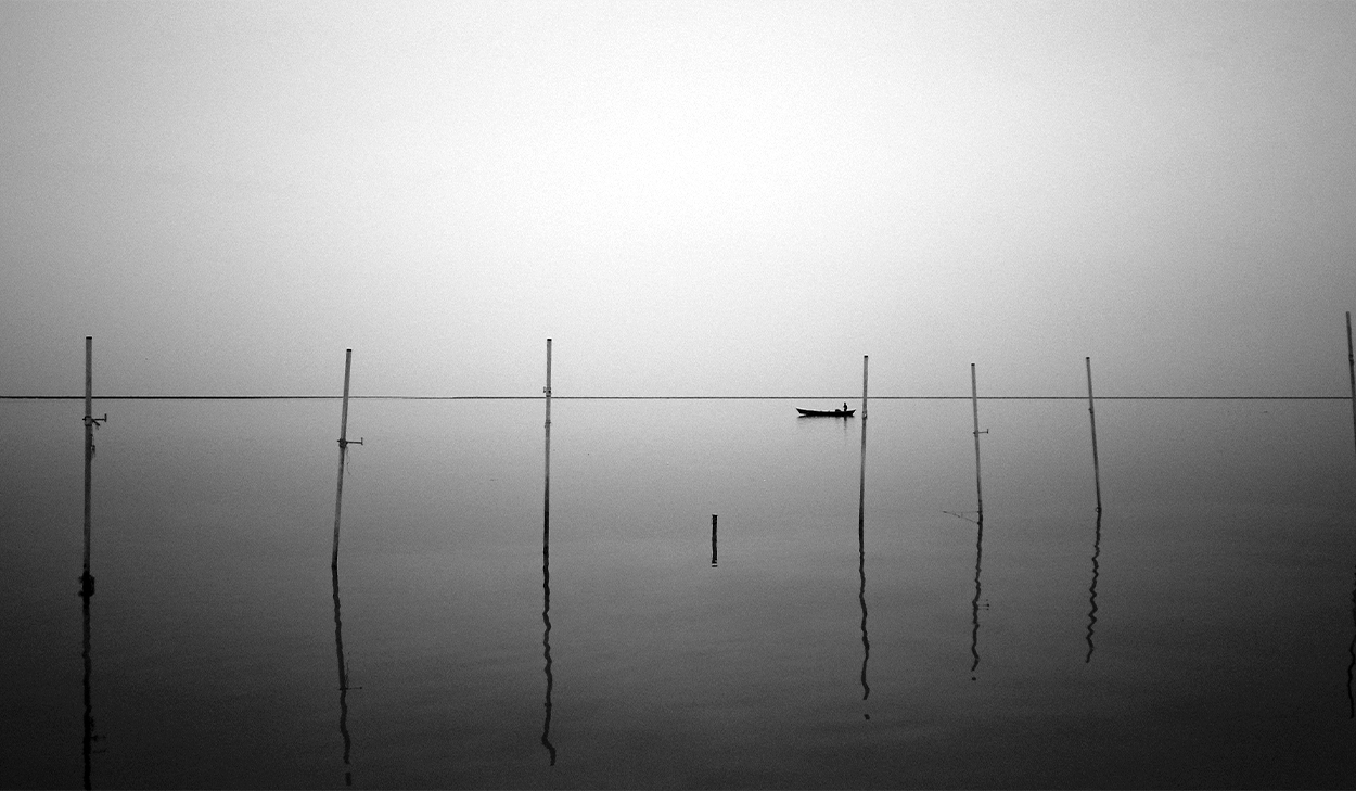 Boat reflected in water