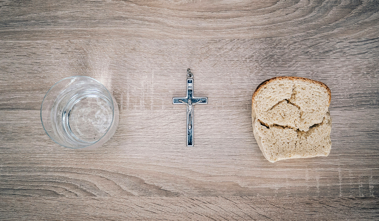 Water, cross, and bread