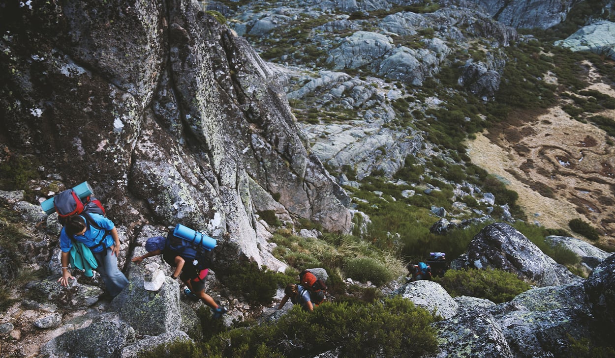People climbing a mountainside