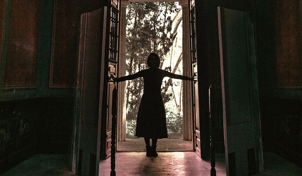 Woman opening a door