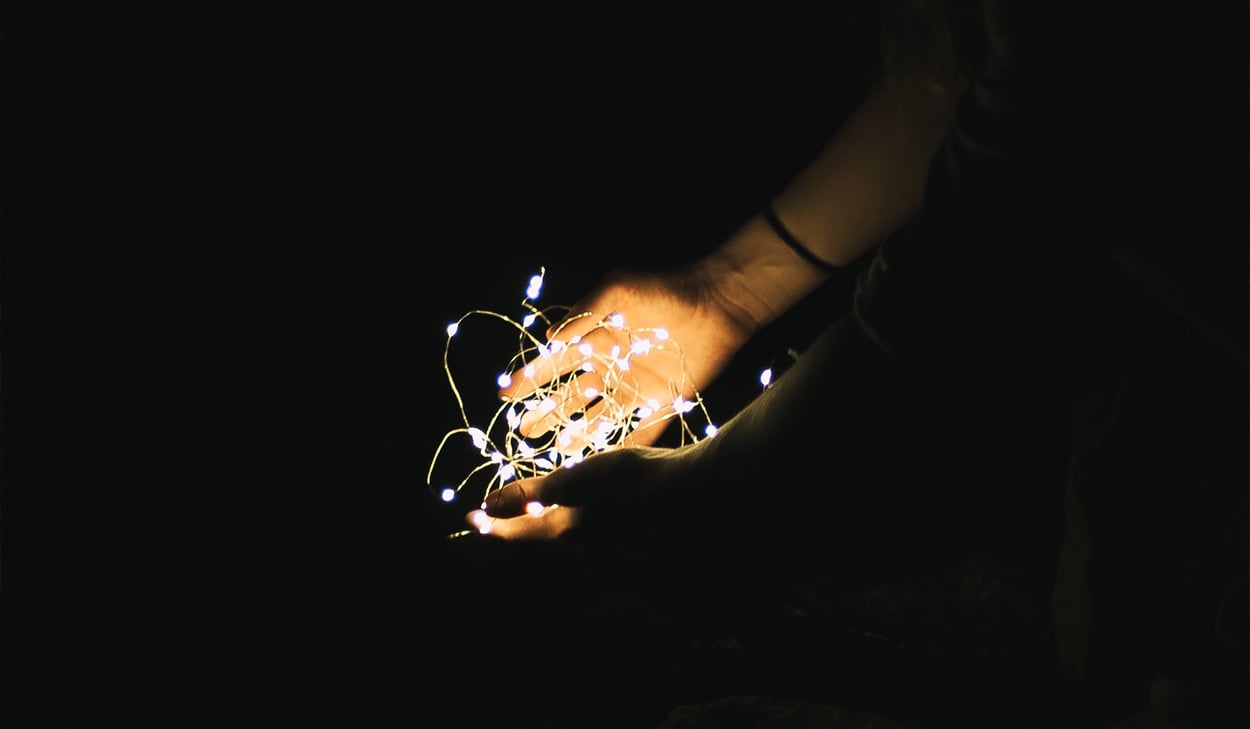 Person holding lights