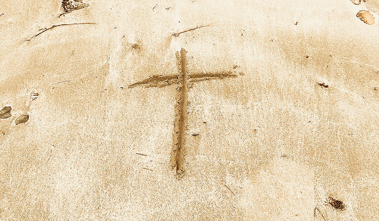 Cross in the sand