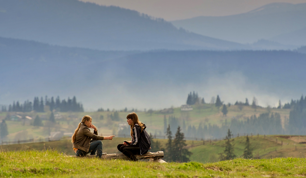 Women talking in a field