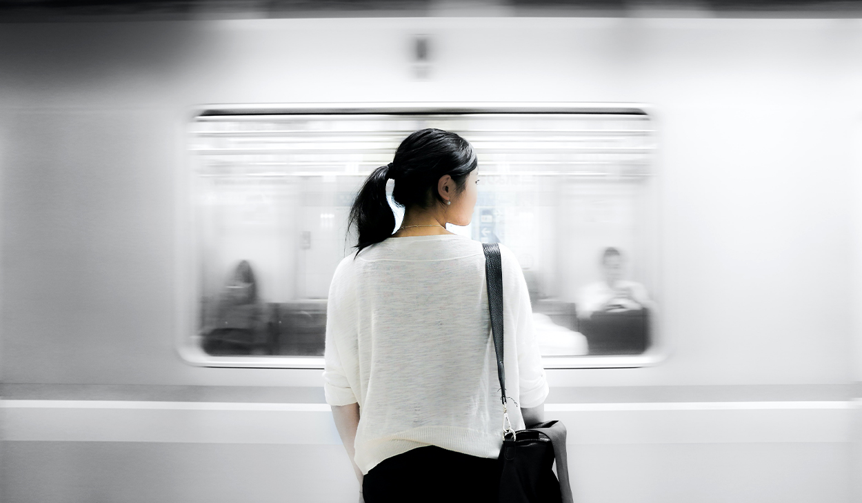 Woman and passing train