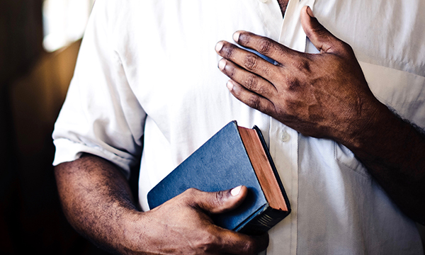 Man holding Bible