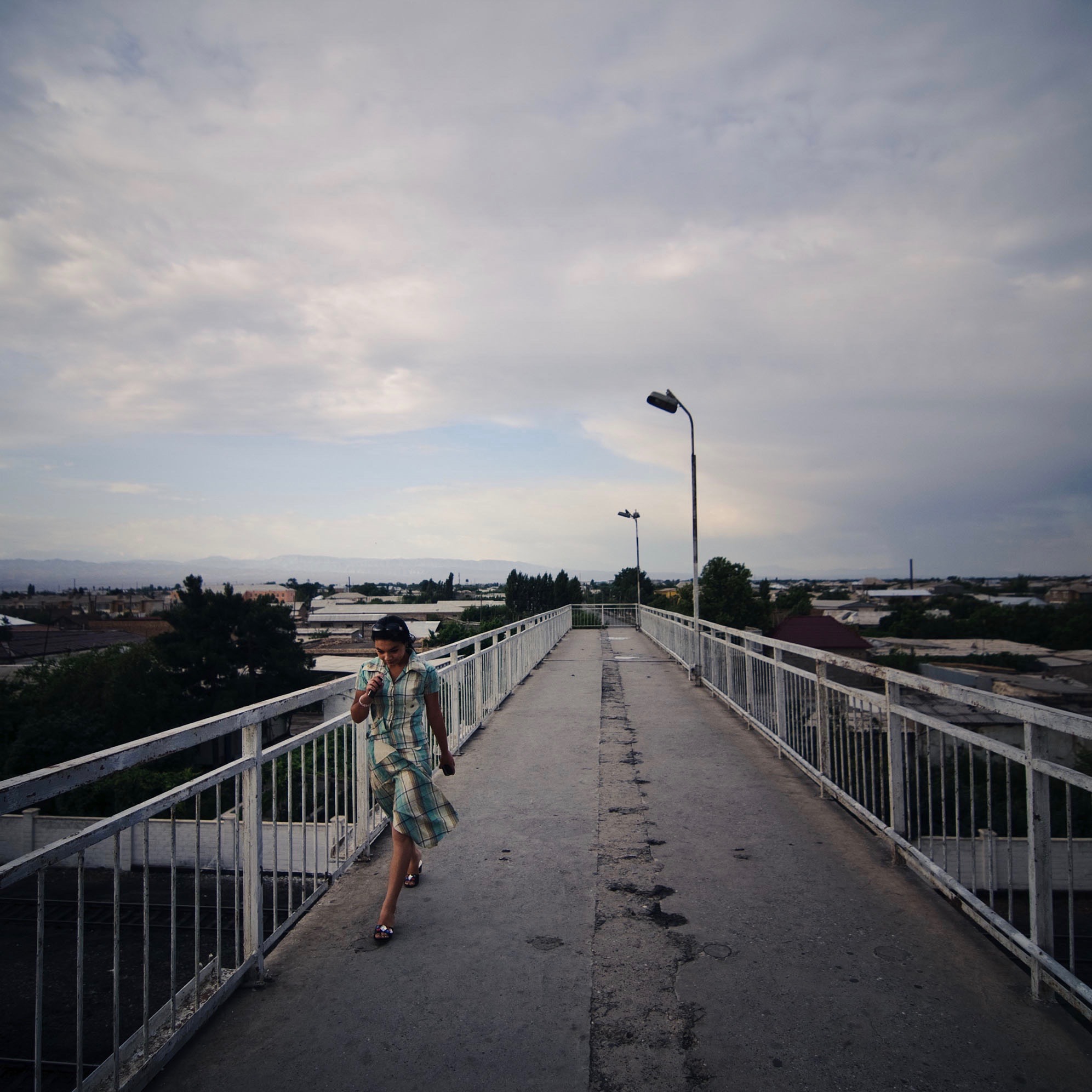 Woman on a bridge