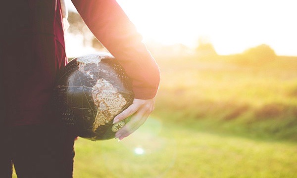 Carrying a globe