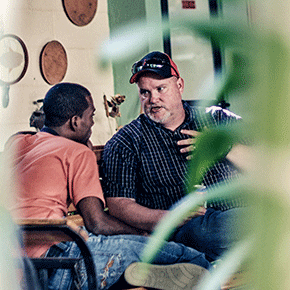 Two men talking