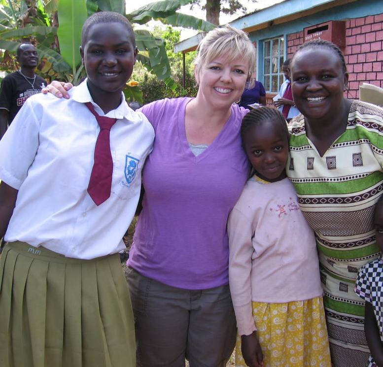 Woman with Kenyan kids