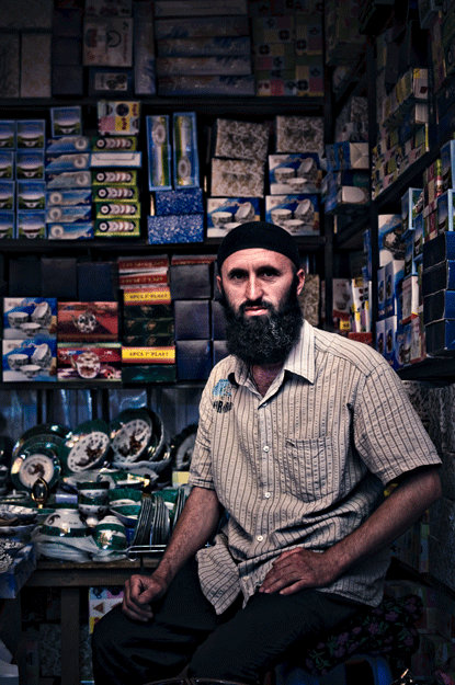 Muslim man in a store room