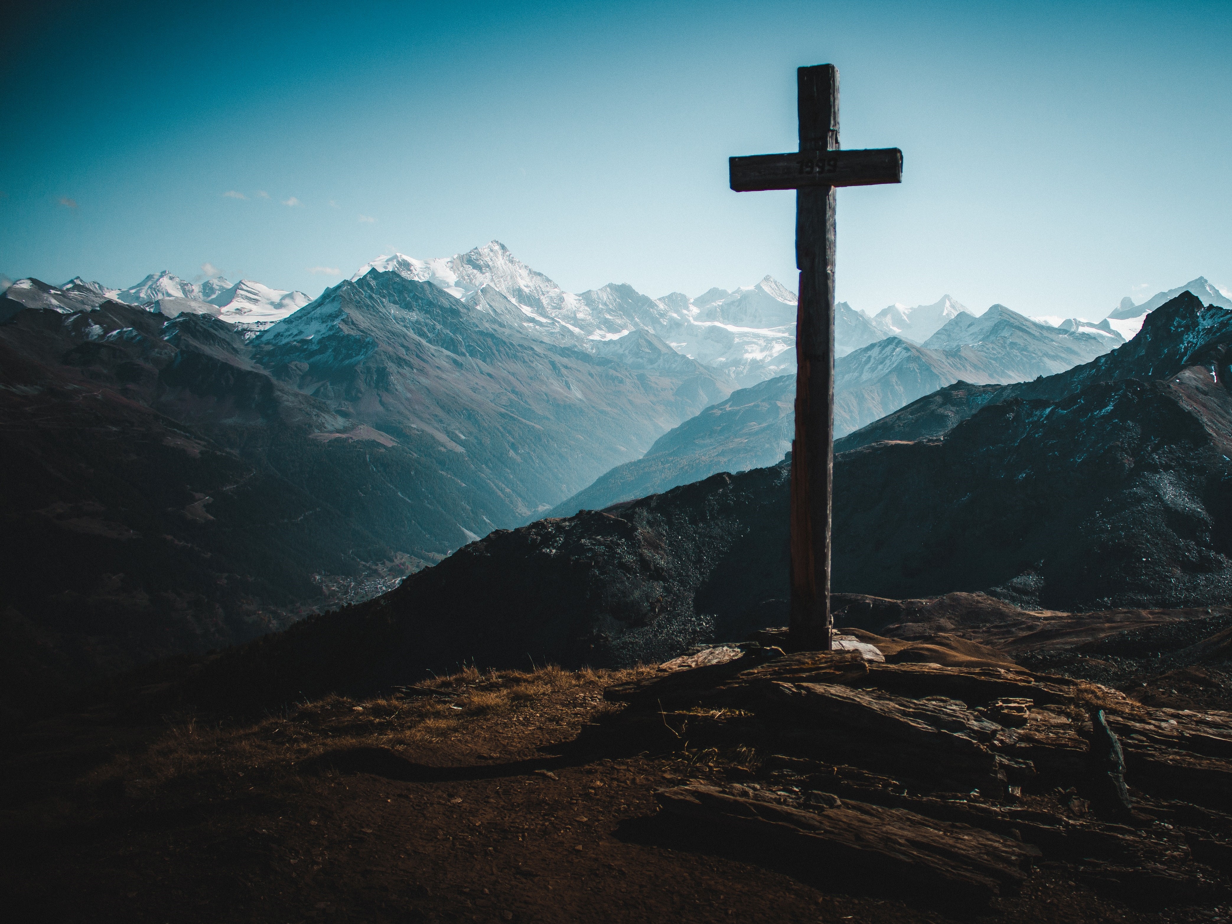 Cross on a mountainside