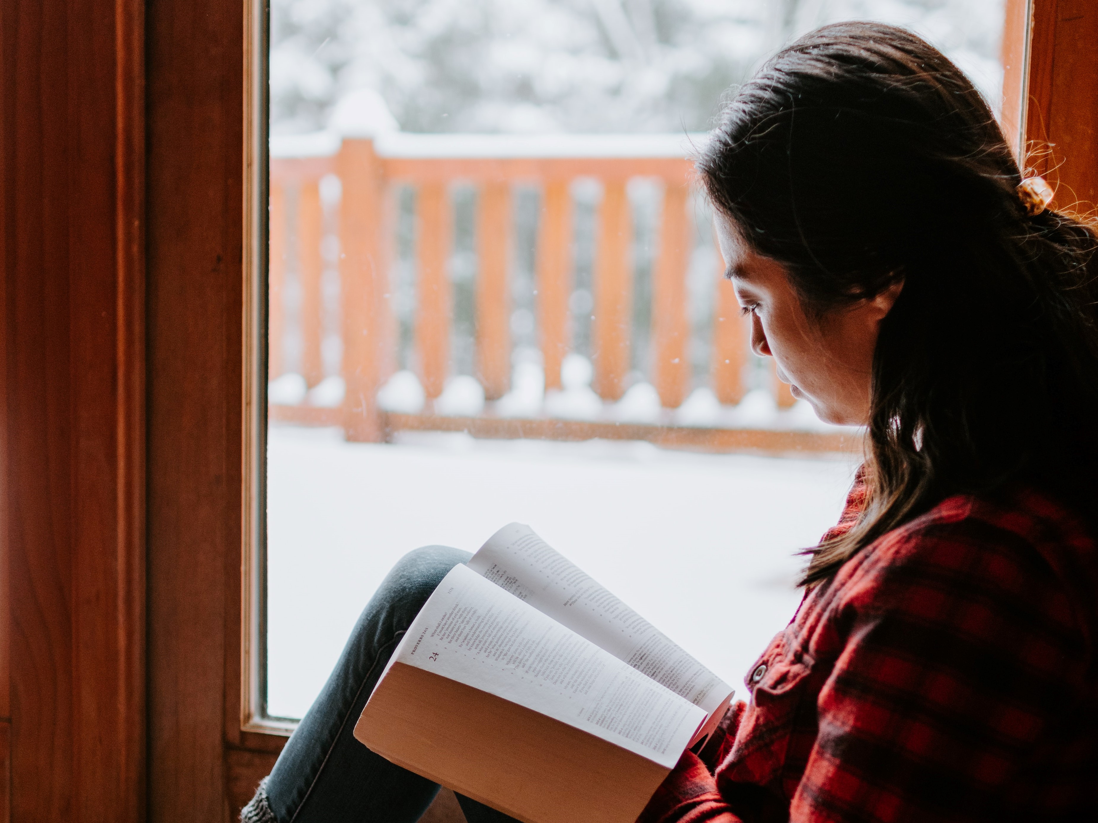 Asian woman reading