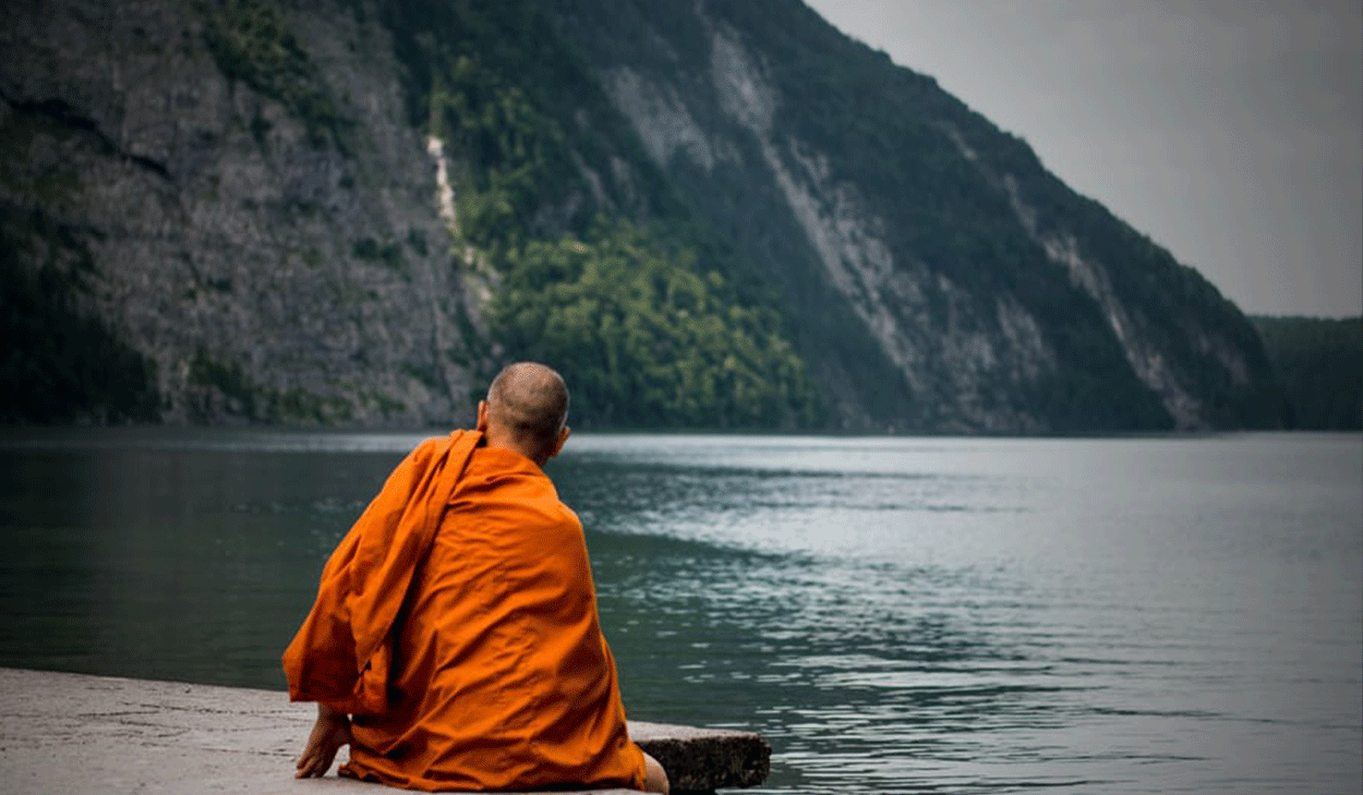 Monk on a shore